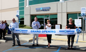 Cutting the ribbon at the official Jones Stephensâ?? West Coast grand opening.