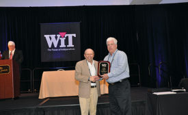 WIT & Co. President Bruce Tucker (left) honors Goodin Co.’s Steve Kelly