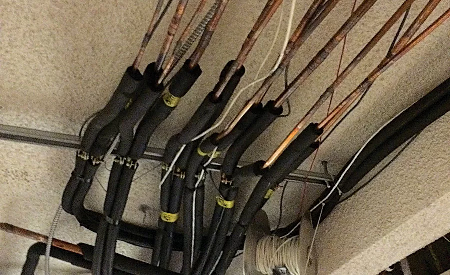 Figure 3 shows some of this tubing being installed in the hallway of a commercial building