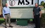 (left) and Marketing Manager Michael Perlman at company headquarters