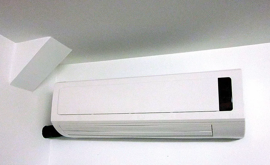 Combining a geothermal heat pump with a boiler