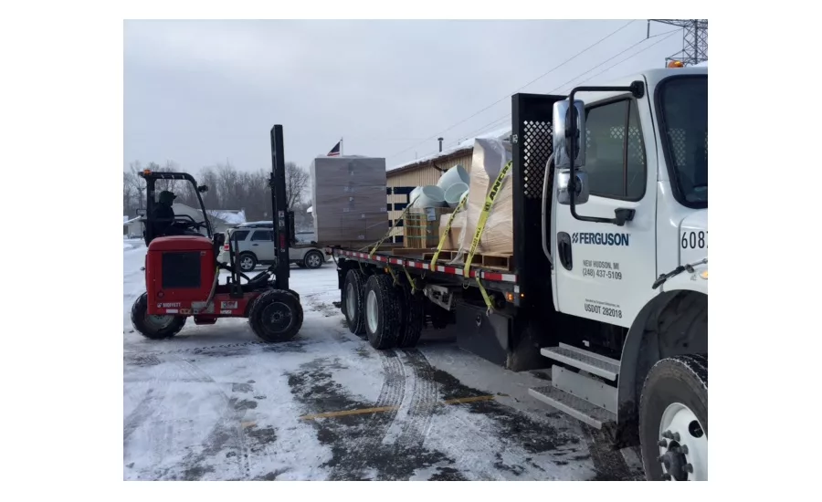 Members of Plumbers Local 370 are loading up their vehicles