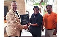 Accepting the award for Winsupply is Tony Victorino, Tucson Winsupply President.