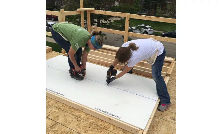 Bradley Corp.’s woman-led team helped out constructing the home’s stairs and wall frames.