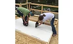 Bradley Corp.’s woman-led team helped out constructing the home’s stairs and wall frames.