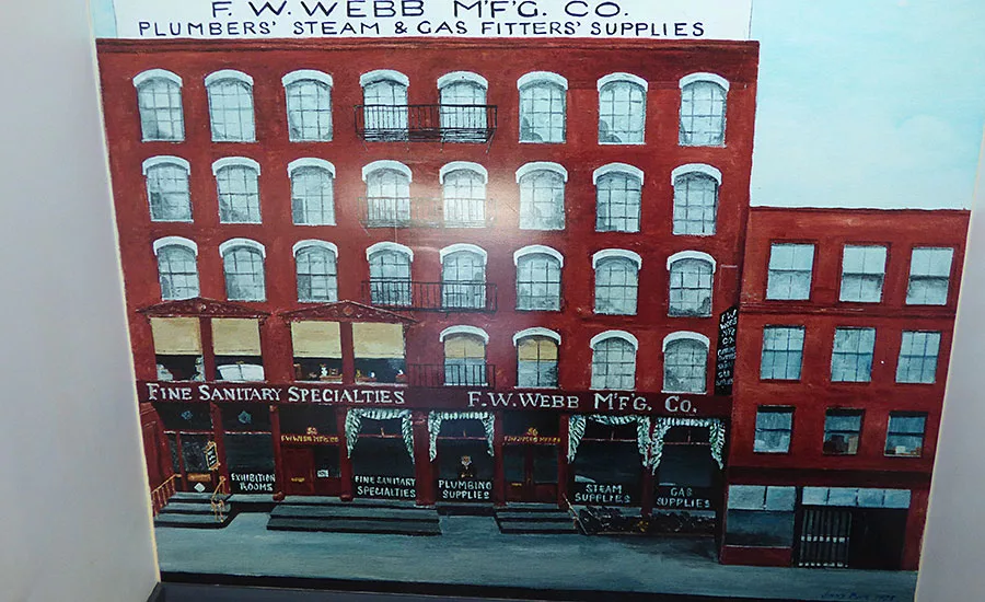 the company’s original headquarters with a likeness of Frank W. Webb standing at a storefront window