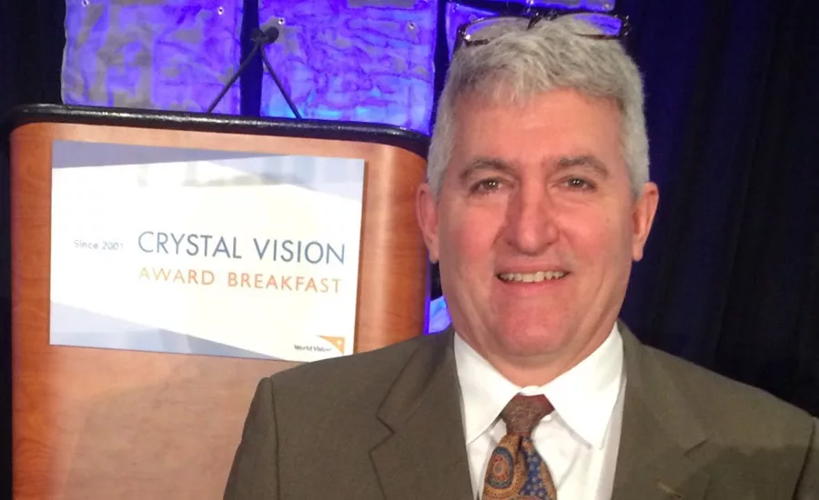 Mansfield Plumbing Products President Jim Morando attends the Crystal Vision Award Breakfast .