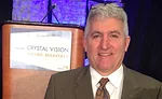 Mansfield Plumbing Products President Jim Morando attends the Crystal Vision Award Breakfast .
