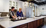 Sales design consultants Jeremy Brown and Susan Taylor