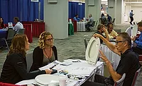 Bemis Mfg. Co.’s Randy Grebel talks to customers during a recent Equity Plumbing annual meeting