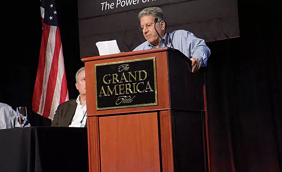 Michael Tannenhauser addresses WIT’s owners during the general session in Salt Lake City