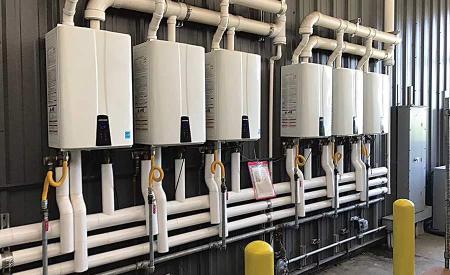 Six Navien NPE-240A tankless water heaters