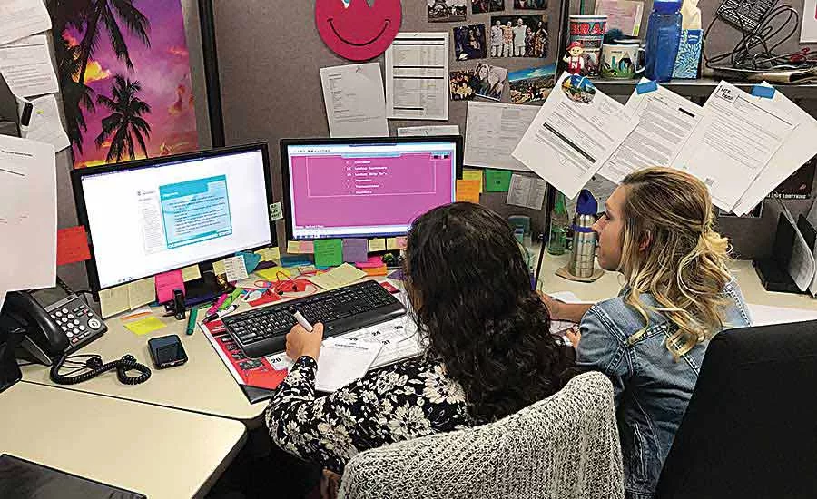 Kara Burns and Kayla O'Reilly Work on an ASA University Course