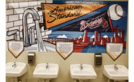 American Standard-branded restrooms feature Pillar tap metering faucets and Lucerne wall-mount sinks.