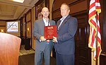 SWA Chairman of the Board John Simmons (Winsupply-Noland Co., left) honors SWA President David Popek (VAMAC)