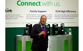 Taco Comfort Solutions President and CEO John Hazen White Jr. speaks to AHR Expo media Monday morning at the company’s booth