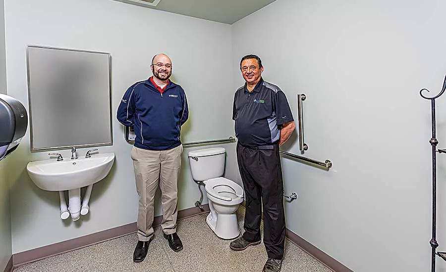 Smith (left) and Pipe Tech Technologies’ Dale Nichols stand