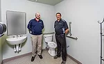 Smith (left) and Pipe Tech Technologies’ Dale Nichols stand