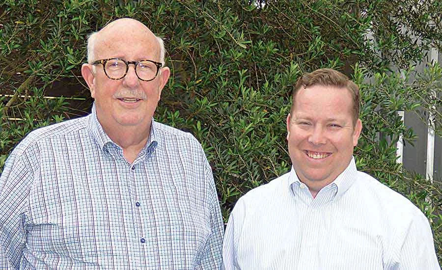 Vice President Chris Fuller (right) with President Harold Armstrong at AWA’s Houston headquarters